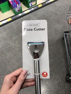 Pizza Cutter?
What appears to be a cheese slicer,  mislabeled!  And, no...I do NOT know why one has to be at least 18 years old to purchase this
Keywords: Pizza;cheese;cutter